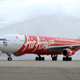An Airbus A340 being greeted after landing on its first Kuala Lumpur to Paris service